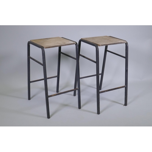 1171 - A pair of vintage industrial laboratory stools, with steel frames and ply seats, 52cm high