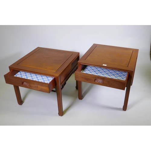 1134 - A pair of Chinese red wood side tables with a single drawer, 61 x 61cm, 55cm high