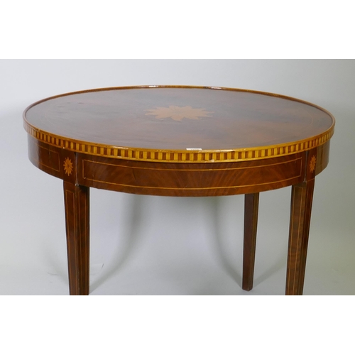 1005 - A marquetry inlaid figured mahogany centre table, with banded frieze top, raised on square tapering ... 