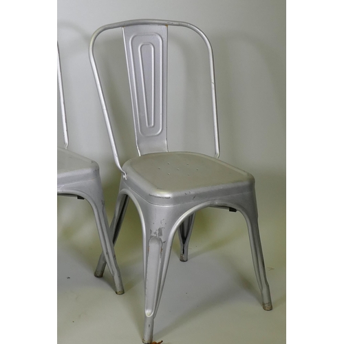 1012 - A set of eight continental Industrial painted steel stacking bistro chairs