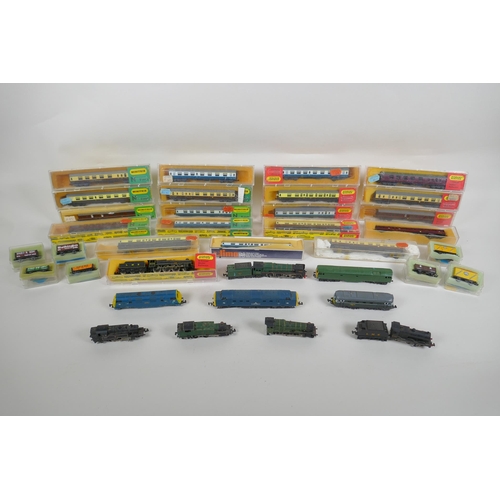 102 - A large quantity of Hornby Minitrix, Atlas, TRIX, Lima etc N gauge locomotives and rolling stock, an... 