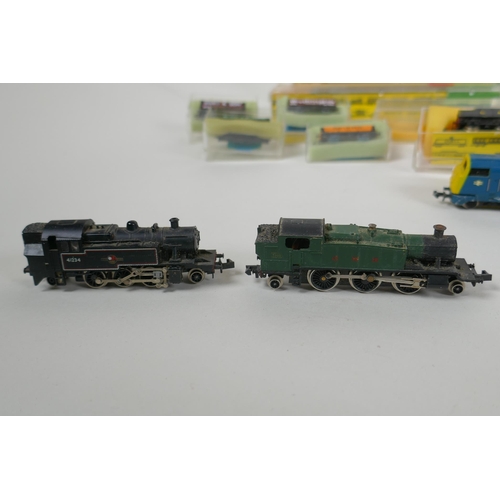 102 - A large quantity of Hornby Minitrix, Atlas, TRIX, Lima etc N gauge locomotives and rolling stock, an... 