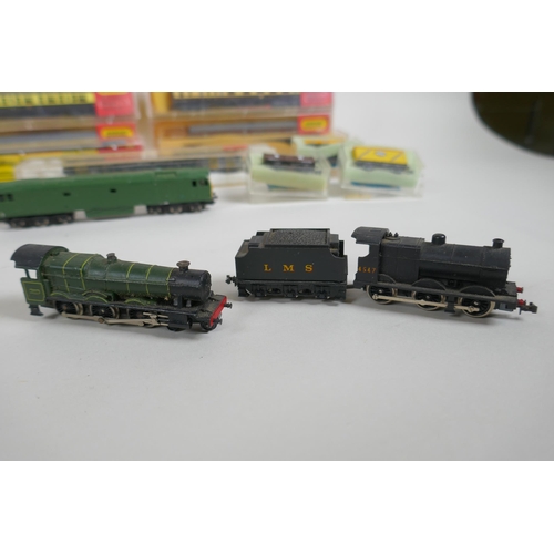 102 - A large quantity of Hornby Minitrix, Atlas, TRIX, Lima etc N gauge locomotives and rolling stock, an... 