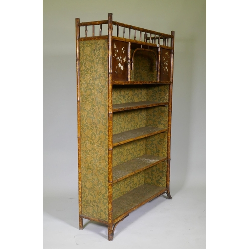 1022 - A good Victorian Aesthetic oriental style bamboo and lacquered open bookcase, with galleried top and... 