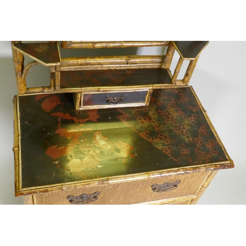 1026 - A Victorian Aesthetic oriental style bamboo and lacquer dressing table with swing mirror and three d... 