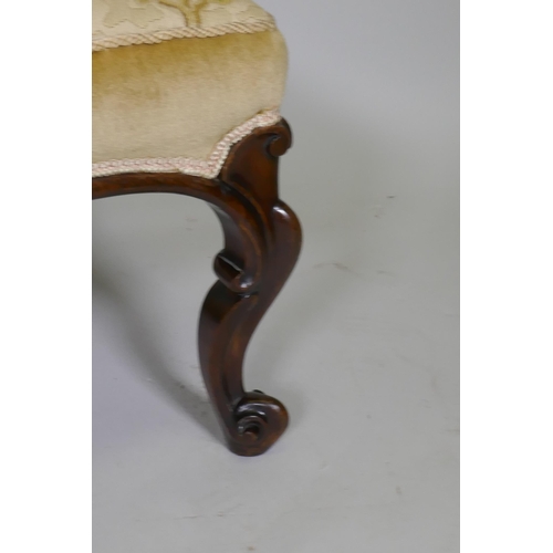 1029 - A C19th carved walnut stool with shaped frieze raised on cabriole supports with scroll feet, 82 x 50... 