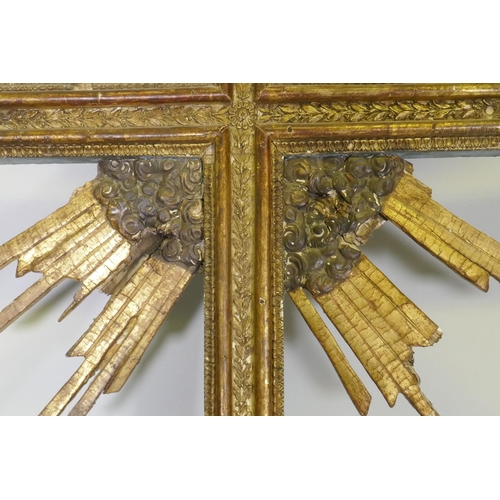 1033 - A continental giltwood and polychrome processional crucifix, with carved and moulded detail retainin... 