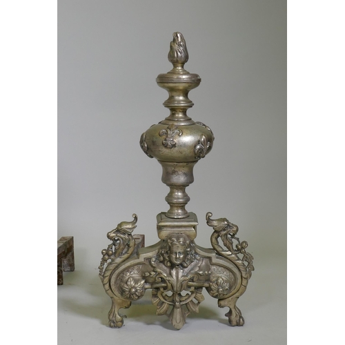 1034 - A pair of C19th French silver plated andirons, with fleur de lys and dragon mask decoration, 50cm hi... 