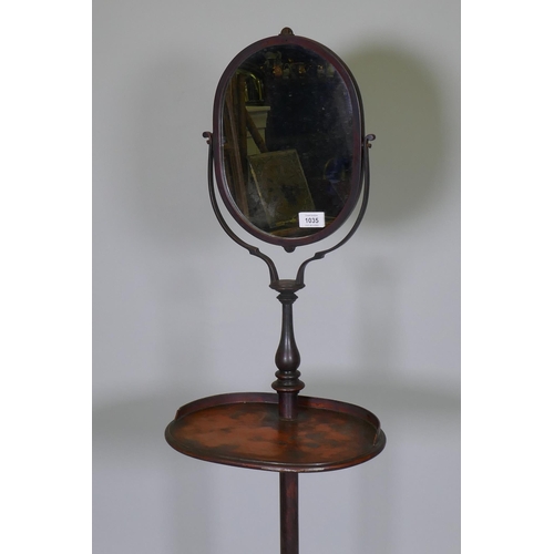 1035 - A C19th painted metal gentleman's shaving stand with tilt and swivel mirror and telescopic stand, 14... 