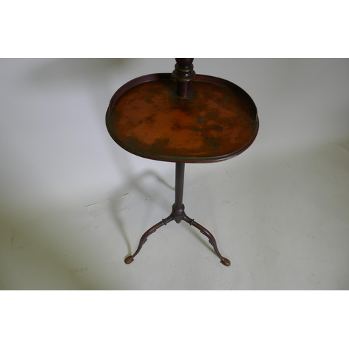 1035 - A C19th painted metal gentleman's shaving stand with tilt and swivel mirror and telescopic stand, 14... 