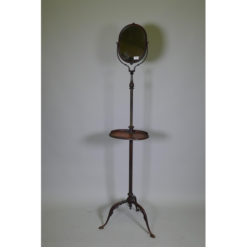 1035 - A C19th painted metal gentleman's shaving stand with tilt and swivel mirror and telescopic stand, 14... 