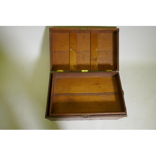 1042 - A C19th campaign teak chest, with brass mounts and carrying handles, the interior fitted with a lift... 