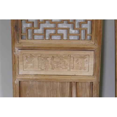 1046 - A pair of Chinese elm door panels, 50 x 140cm