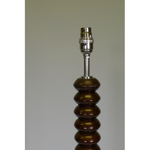 1047 - A bobbin turned mahogany standard lamp with chrome mounts, 142cm high