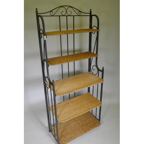 1049 - A folding metal pot rack with five wicker shelves, 80 x 42 x 186cm