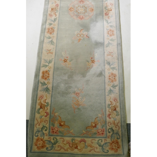 1059 - A Chinese wool runner, 86 x 317cm