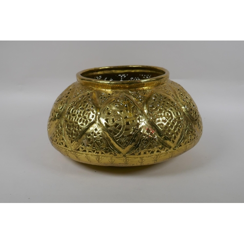 107 - A C19th Iranian Qajar gilt brass pierced vessel, 32cm diameter