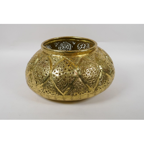 107 - A C19th Iranian Qajar gilt brass pierced vessel, 32cm diameter