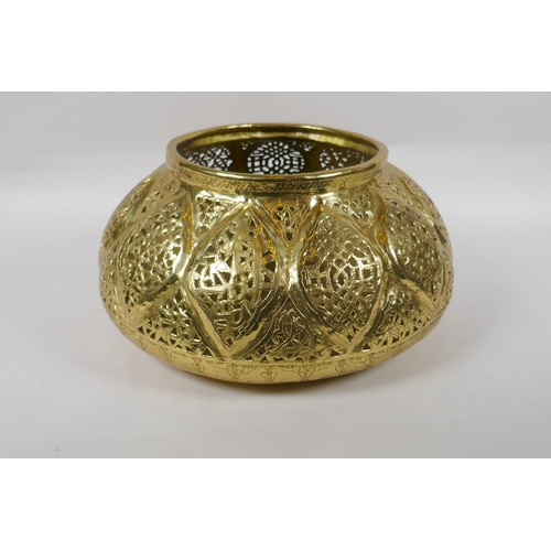 107 - A C19th Iranian Qajar gilt brass pierced vessel, 32cm diameter