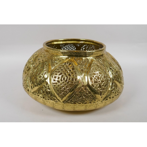 107 - A C19th Iranian Qajar gilt brass pierced vessel, 32cm diameter