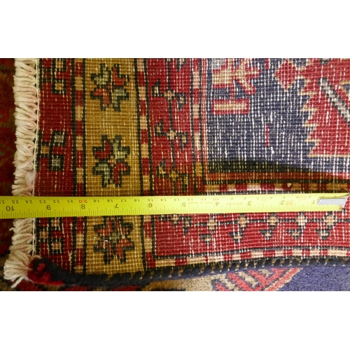 1071 - A fine woven Iranian runner, with bespoke medallion design on a rich blue field, 90 x 305cm