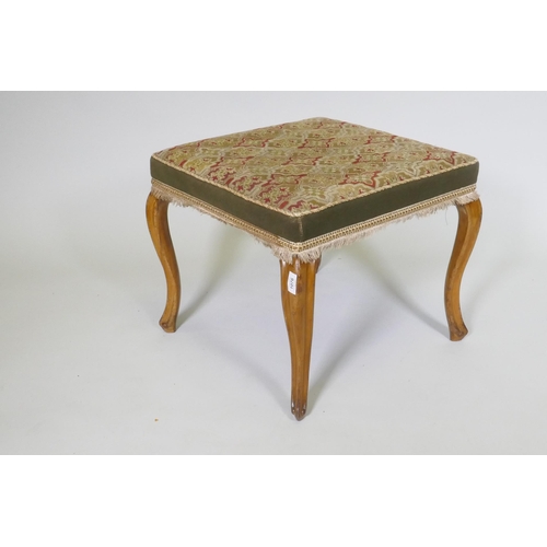 1076 - A Victorian walnut stool with tapestry cover, raised on cabriole supports, 53 x 53 x 46cm