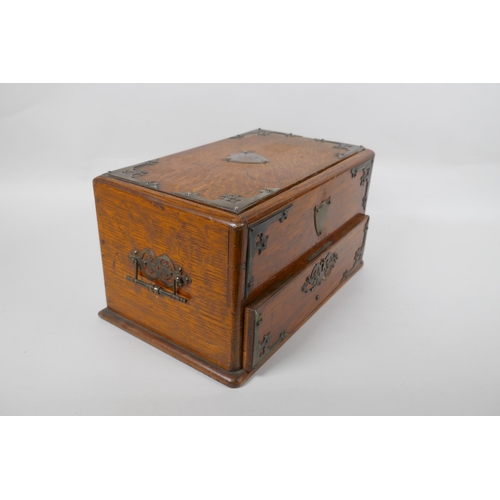 108 - An antique oak smokers companion box with silver plated mounts, 33 x 20cm, 18cm high