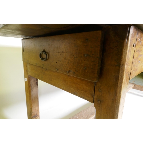 1080 - An C18th fruit wood refectory table with oak planked top and raised on square chamfered supports uni... 