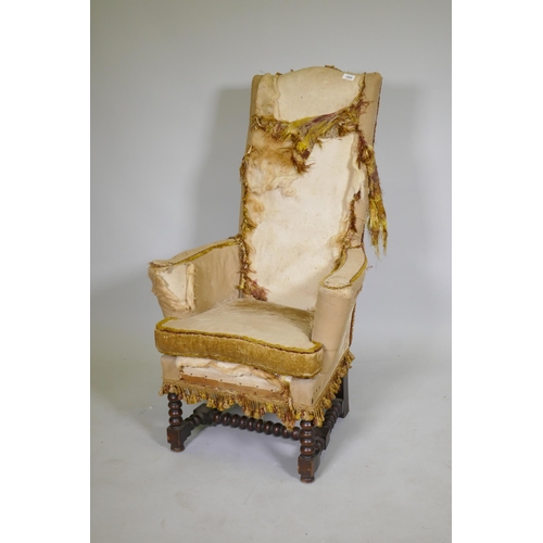 1085 - A country house high back throne style chair, labelled White Allom & Co, London, Montreal, New Y... 