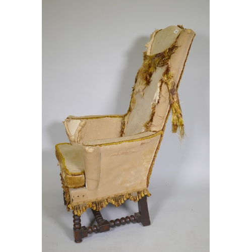 1085 - A country house high back throne style chair, labelled White Allom & Co, London, Montreal, New Y... 