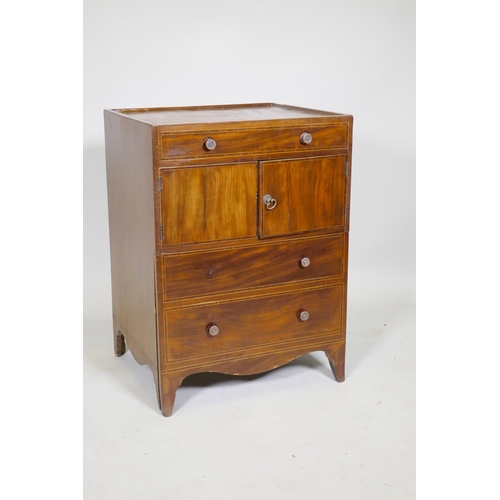 1088 - A Georgian mahogany commode/dressing chest with lift up top, two cupboards and pull out bottom drawe... 