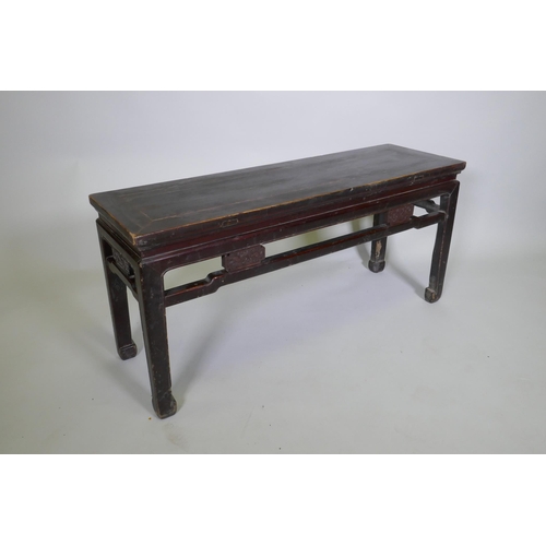 1094 - A Chinese hardwood low table, 109 x 34cm 50cm high