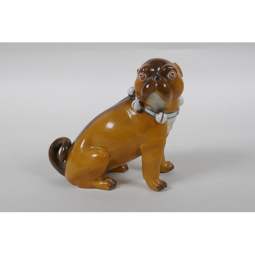 110 - An antique continental porcelain pug dog, AF, marks to base, 13cm high