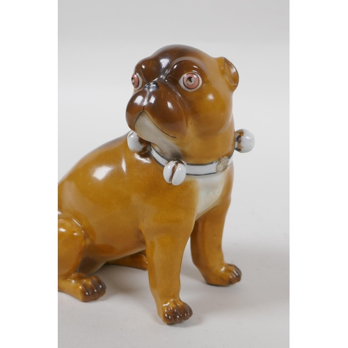 110 - An antique continental porcelain pug dog, AF, marks to base, 13cm high