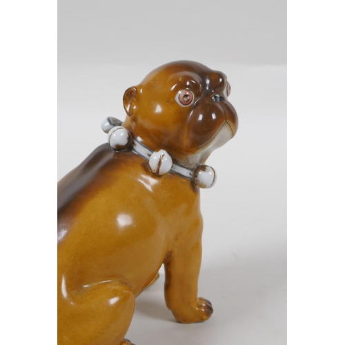 110 - An antique continental porcelain pug dog, AF, marks to base, 13cm high