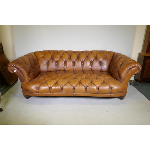 1100 - A Tetrad Oskar deep button tan leather sofa, 230cm wide