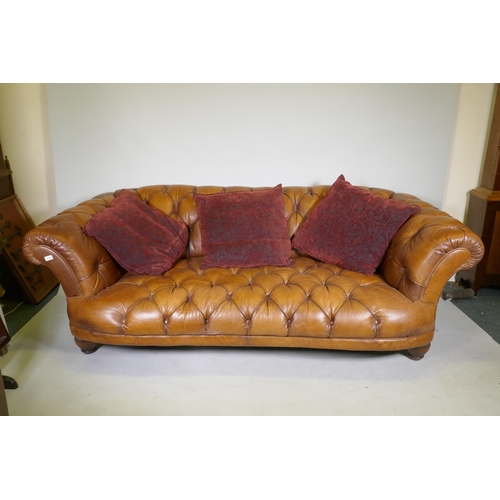 1100 - A Tetrad Oskar deep button tan leather sofa, 230cm wide