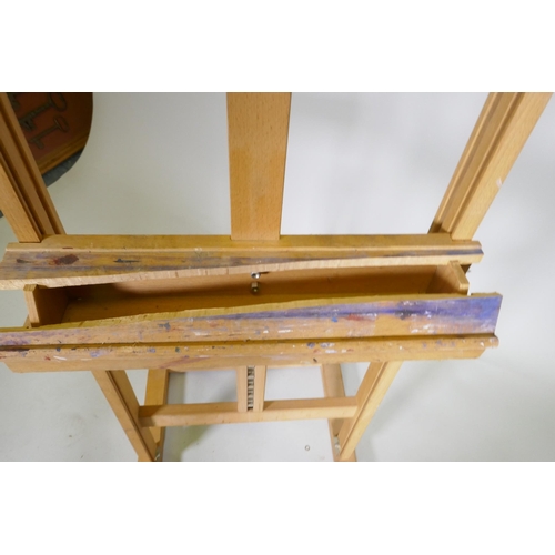 1107 - A Winsor & Newton artist's easel, 147cm high