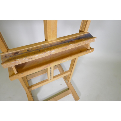 1107 - A Winsor & Newton artist's easel, 147cm high