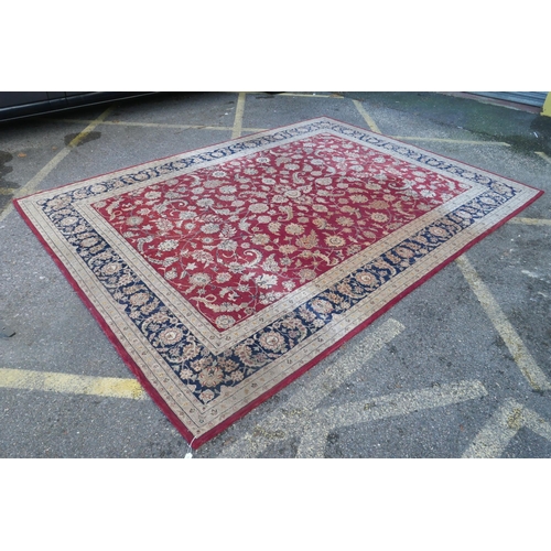 1108 - A good quality deep pile silk and wool carpet with Persian inspired design