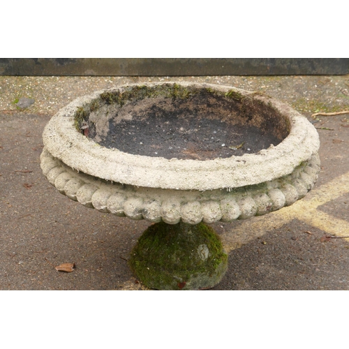 1111 - A vintage reconstituted stone urn on column base, 78cm diameter