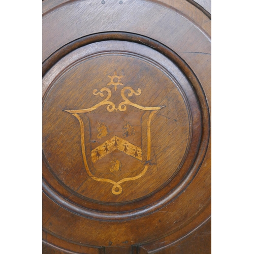 1118 - Architectural salvage, C19th oak panelling with marquetry inlaid armorial crest, 151 x 153cm