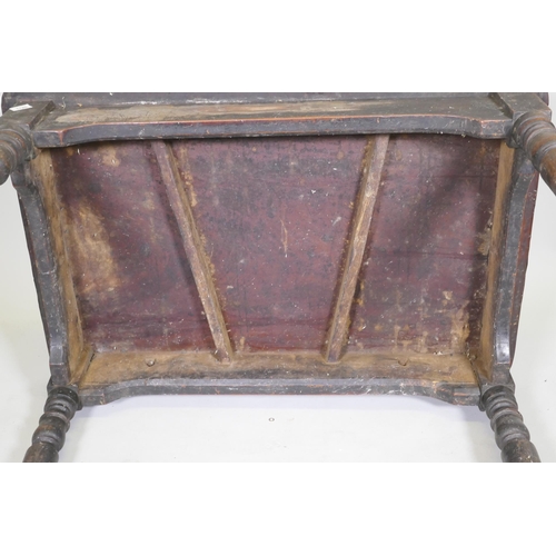 1125 - A C19th mahogany tavern type table, the one piece top with brass edge, raised on turned supports, 10... 