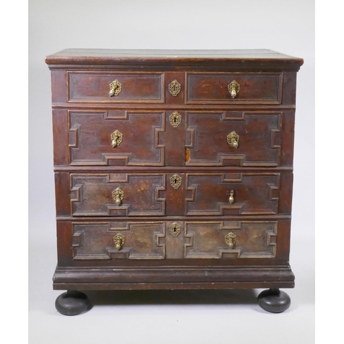 1126 - A late C17th/early C18th oak garret chest of four drawers, raised on bun feet, with adaptions, 95 x ... 