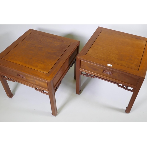 1134 - A pair of Chinese red wood side tables with a single drawer, 61 x 61cm, 55cm high