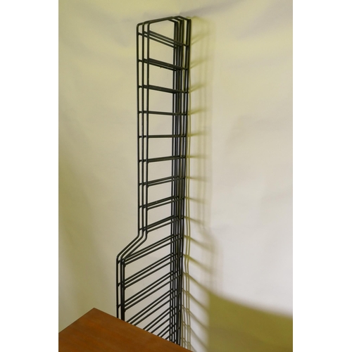 1161 - A mid century mahogany Ladderax style wall system of two cabinets and shelves, 178cm high