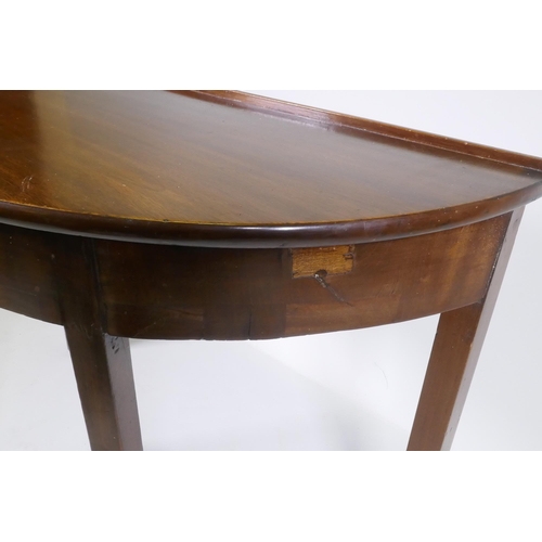 1165 - A C19th mahogany demi lune side table, raised on square supports, 103 x 46 x 72cm