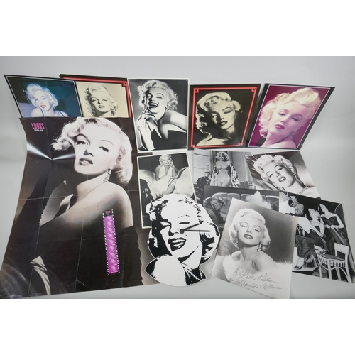 118 - A quantity of Marilyn Monroe ephemera to include press photographs, lobby cards, posters, cuttings, ... 