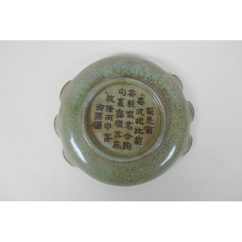 123 - A Chinese celadon crackle glazed porcelain dish with frilled rim, chased character inscription to ba... 