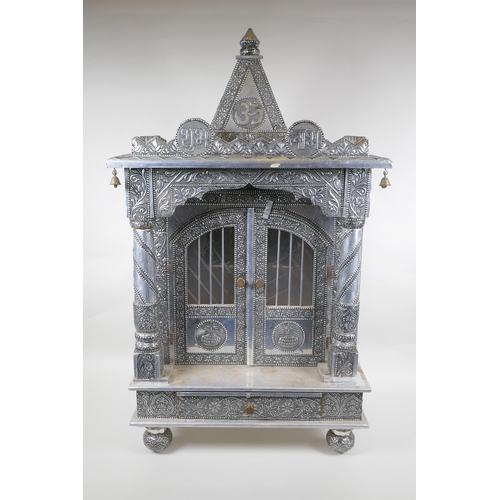 127 - An Indian white metal veneered wooden table top shrine, 46 x 26cm, 82cm high